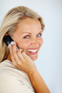 istock_smiling40-ishwomanonphone_small